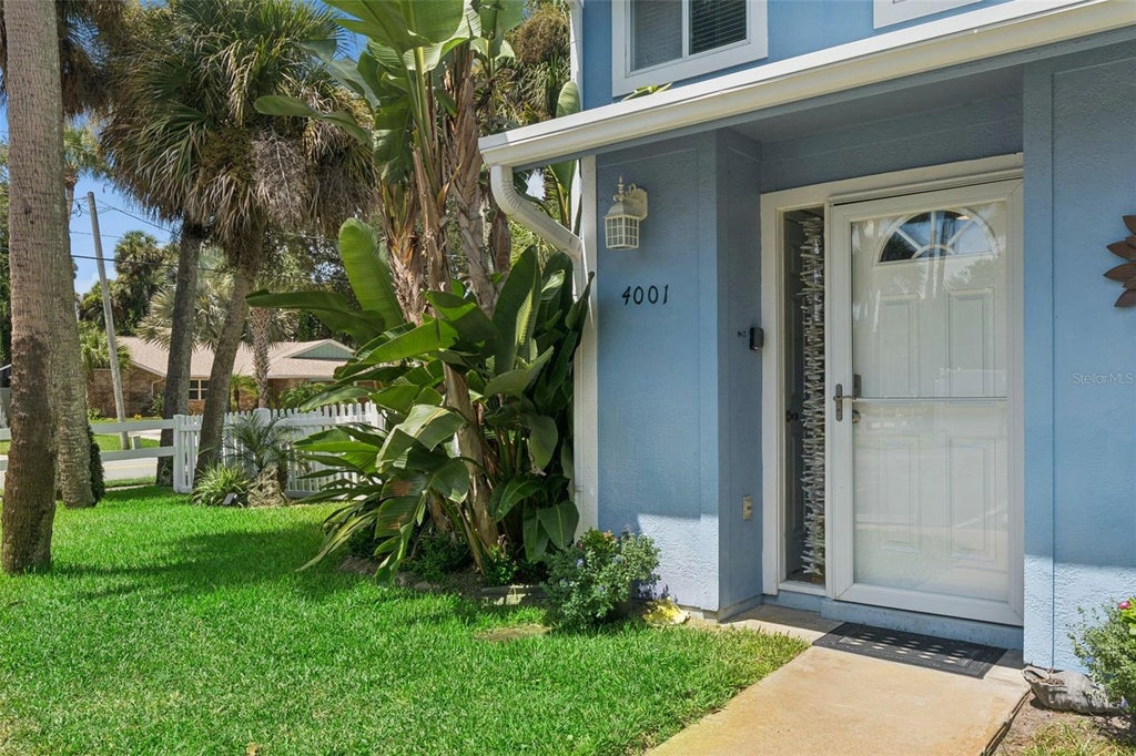 Photo of 4001 Saxon Drive, New Smyrna Beach, FL 32169 (MLS # O6437800)