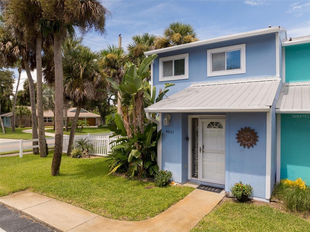 Photo of 4001 Saxon Drive, New Smyrna Beach, FL 32169 (MLS # O6437800)