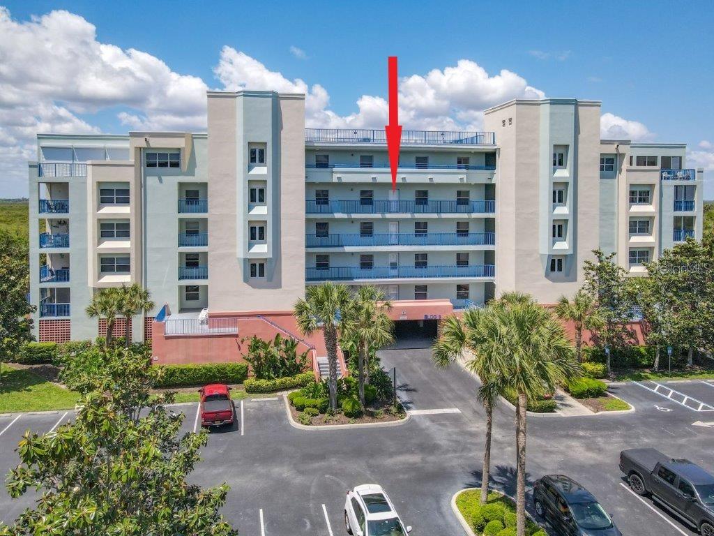 Aggressively priced and ready for its next owner, this furnished 3-bedroom, 2-bath condo offers the perfect blend of comfort, convenience, and coastal living. Located just steps from the clubhouse, pool, and community amenities—and right across the street from the beach—this home is ideally situated for both relaxation and recreation. Step inside to a generously sized open floor plan that seamlessly connects the kitchen, dining area, and living room—perfect for entertaining or relaxing. The living area extends to a tiled and screened balcony with unobstructed sunset and estuary views, creating a tranquil retreat to enjoy every evening. This 5th-floor unit boasts soaring 9-foot ceilings—available only on this level—creating an airy and expansive feel throughout. Notable upgrades include a new A/C unit in 2023, new rollers on all patio doors in 2025, updated appliances, and an upgraded glass shower door in the primary suite, just to name a few. A standout feature of the '04' units is the generously sized laundry room, which also provides valuable additional storage space. The community is packed with resort-style amenities: two clubhouses, two pools and spas, fitness centers, tennis courts, shuffleboard, bocce ball, and a scenic walking trail behind the complex. Whether you're seeking a full-time residence, vacation home, or investment property, this well-maintained condo has it all—location, value, and views. Schedule your showing today and see for yourself!