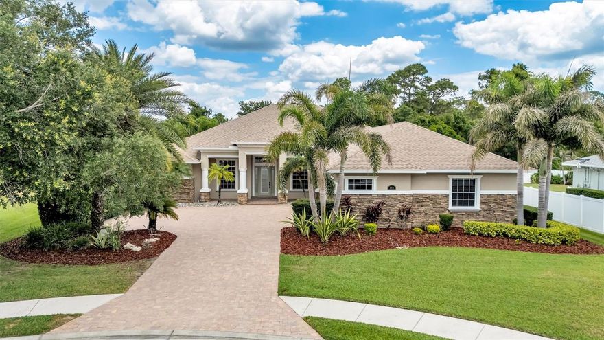 Tucked at the end of a cul-de-sac in Mill Creek, this is the kind of home people wait for. Big, bold, unforgettable — with the space to truly live, entertain, and make memories on a grand scale.

Offering 4 bedrooms, 4 bathrooms, a private den, and an enormous bonus room, this home was designed for flexibility and fun. Whether you need space for guests, multigenerational living, a game room, home theater, gym, or the ultimate hangout spot — this home delivers room for it all without sacrificing warmth or style.

The heart of the home opens effortlessly to an incredible outdoor oasis that feels more like a private resort than a backyard. A stunning rock waterfall cascades into the sparkling pool, while the hot tub, expansive patio areas, and outdoor kitchen create the perfect setting for everything from quiet evenings under the stars to unforgettable parties with family and friends.

Inside, the kitchen is both functional and full of character, featuring a hidden pantry that adds the perfect touch of charm and convenience while keeping everything beautifully tucked away.

The fenced yard offers space to roam, while the massive 1,125 sq. ft. garage is a dream for car enthusiasts, hobbyists, storage needs, or all the toys that come with Florida living.
And with major updates already completed — including a 2023 roof and new air conditioners in 2024 — buyers can focus less on projects and more on enjoying everything this exceptional home has to offer.
Homes with this much personality, functionality, and entertaining power rarely hit the market in Mill Creek. LOW HOA and NO CDD fees