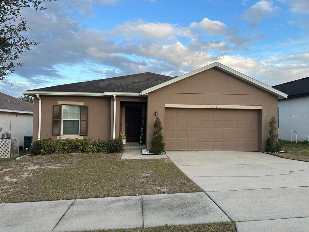 Photo of 128 Tanager Street, Haines City, FL 33844 (MLS # O6374865)