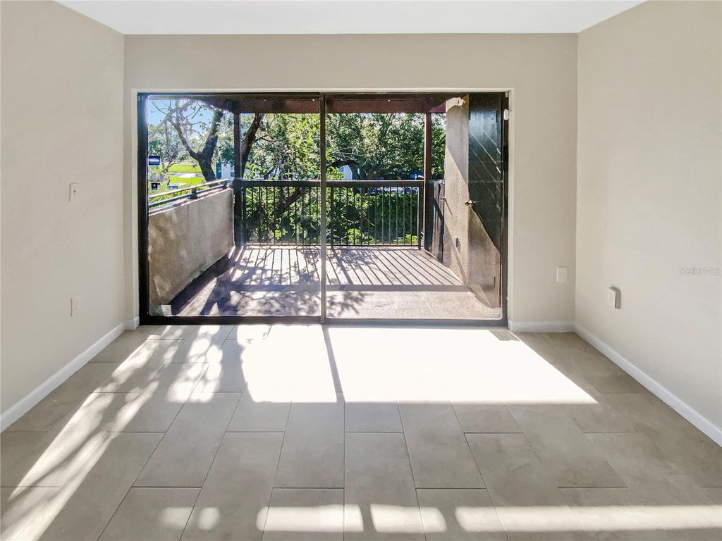 Photo of 705 S Village Drive N #205, St Petersburg, FL 33716 (MLS # O6380803)