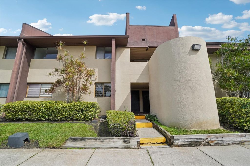 Photo of 705 S Village Drive N #205, St Petersburg, FL 33716 (MLS # O6380803)