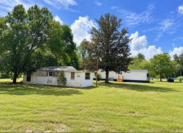 Photo of 19391 SE 21st Place, Morriston, FL 32668 (MLS # TB8546235)