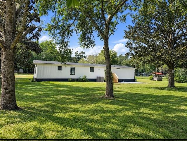 Photo of 19391 SE 21st Place, Morriston, FL 32668 (MLS # TB8546235)