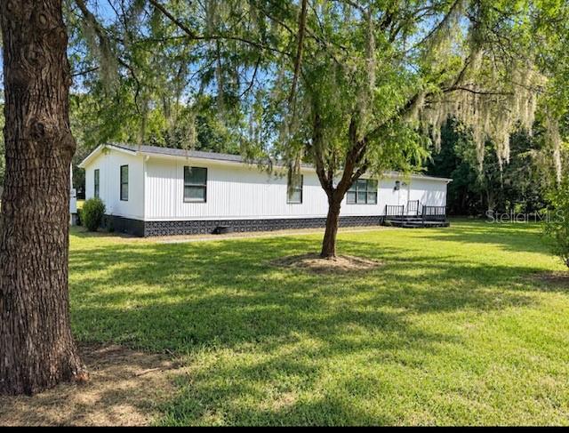 Photo of 19391 SE 21st Place, Morriston, FL 32668 (MLS # TB8546235)