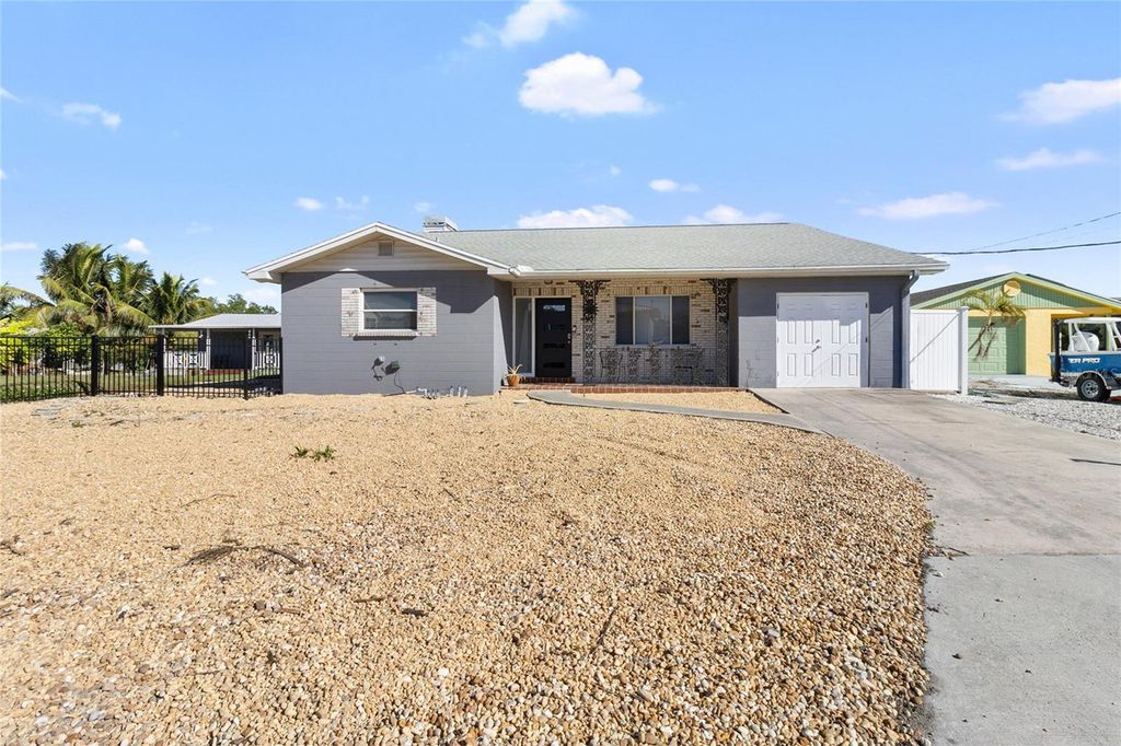 Photo of 824 Seabreeze Drive, Ruskin, FL 33570 (MLS # TB8477879)