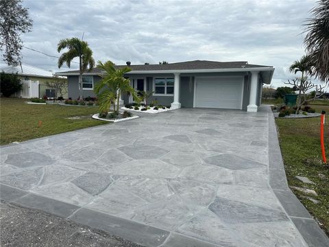 Photo of 717 Crestview Circle NW, Port Charlotte, FL 33948 (MLS # C7519499)