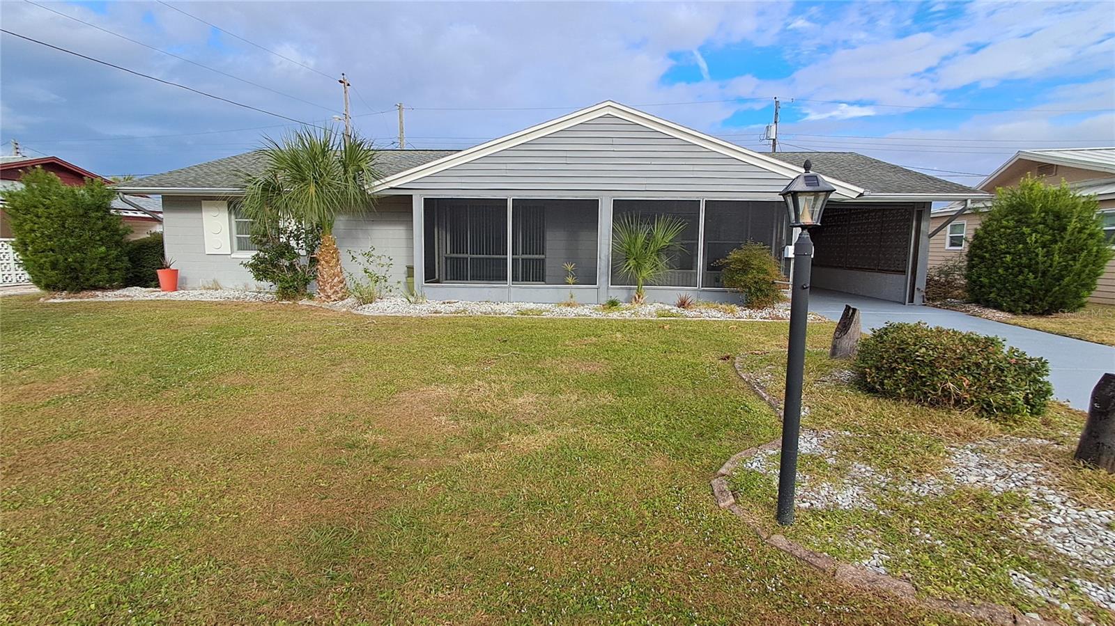 This home is located in the 55+ community of Sun City Center, which was recently voted as the #1 retirement community by a national Realtor magazine. It is conveniently located near the SCC recreation facilities in a golf cart friendly community and a No HOA neighborhood. Back yard could be fenced for your four legged friend or add on a porch or pool. Washer/Dryer combo inside, extra dryer in storage room. screened front patio and carport with an electric role down screen, Terrazzo floors underneath most floor coverings, tile underneath carpet in Florida room. Brand new epoxy floors on driveway,porch,garage and back walkway. Put this on your must see list! Come live the Florida lifestyle today! Sun City Center has a state of the art fitness center, indoor Olympic lap pool, resistance pool & outdoor pool, softball, pickle ball, tennis, arts/crafts, model train, woodworking, lawn bowling, dancing & 100+ clubs & activities. Conveniently located to Tampa, Sarasota, St. Petersburg, Tampa International Airport, sporting events, beaches, theaters, shopping, dining & more!