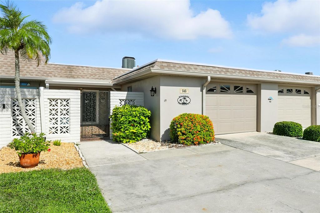 Photo of 545 Boca Ciega Point Boulevard N, St Petersburg, FL 33708 (MLS # TB8424913)