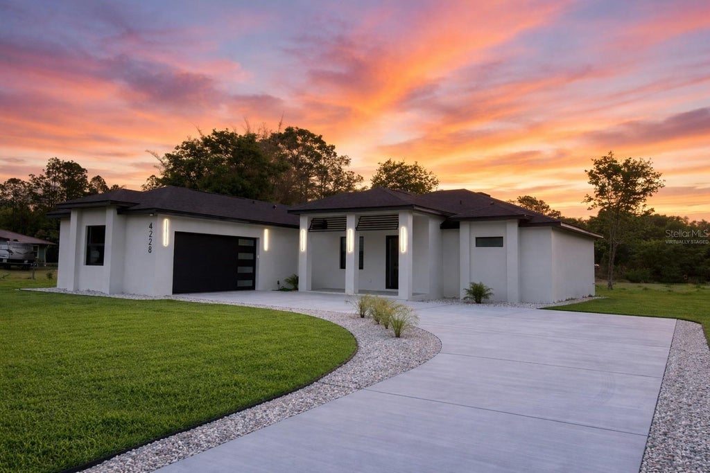 Photo of 4228 Foxwood Boulevard, Wesley Chapel, FL 33543 (MLS # TB8545511)