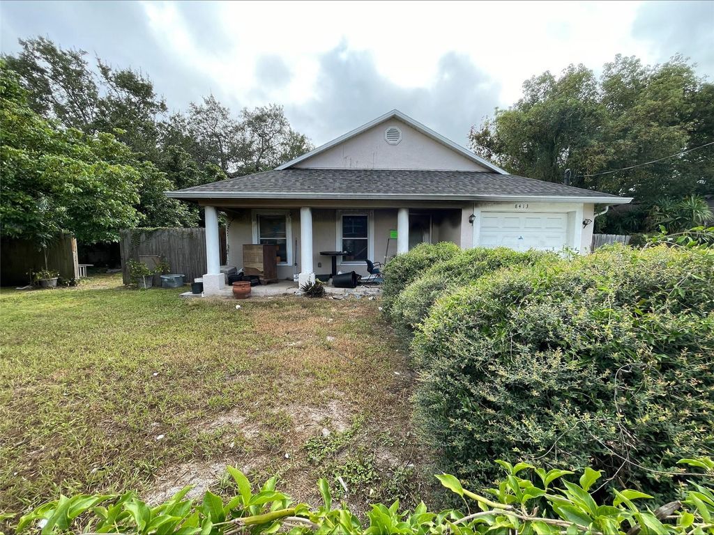 Photo of 8413 N Highland Avenue, Tampa, FL 33604 (MLS # O6348782)