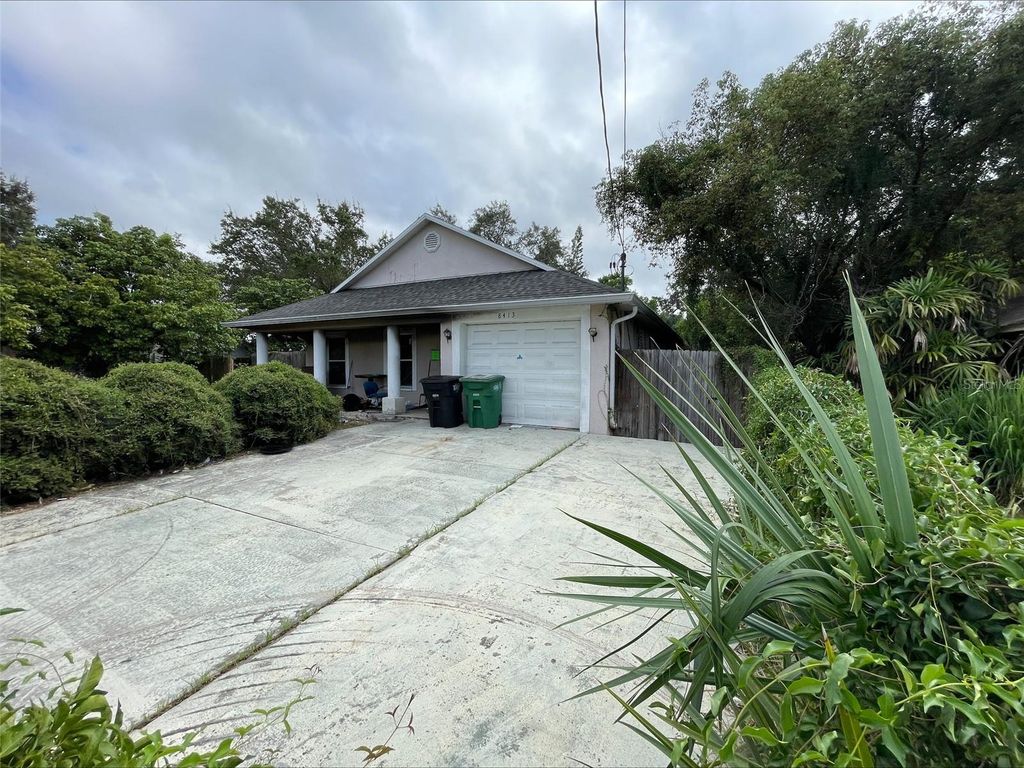 Photo of 8413 N Highland Avenue, Tampa, FL 33604 (MLS # O6348782)