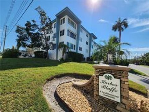 A home in BELLEAIR BLUFFS