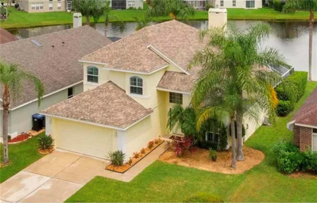 Photo of 624 Hardwood Circle, Orlando, FL 32828 (MLS # O6434447)