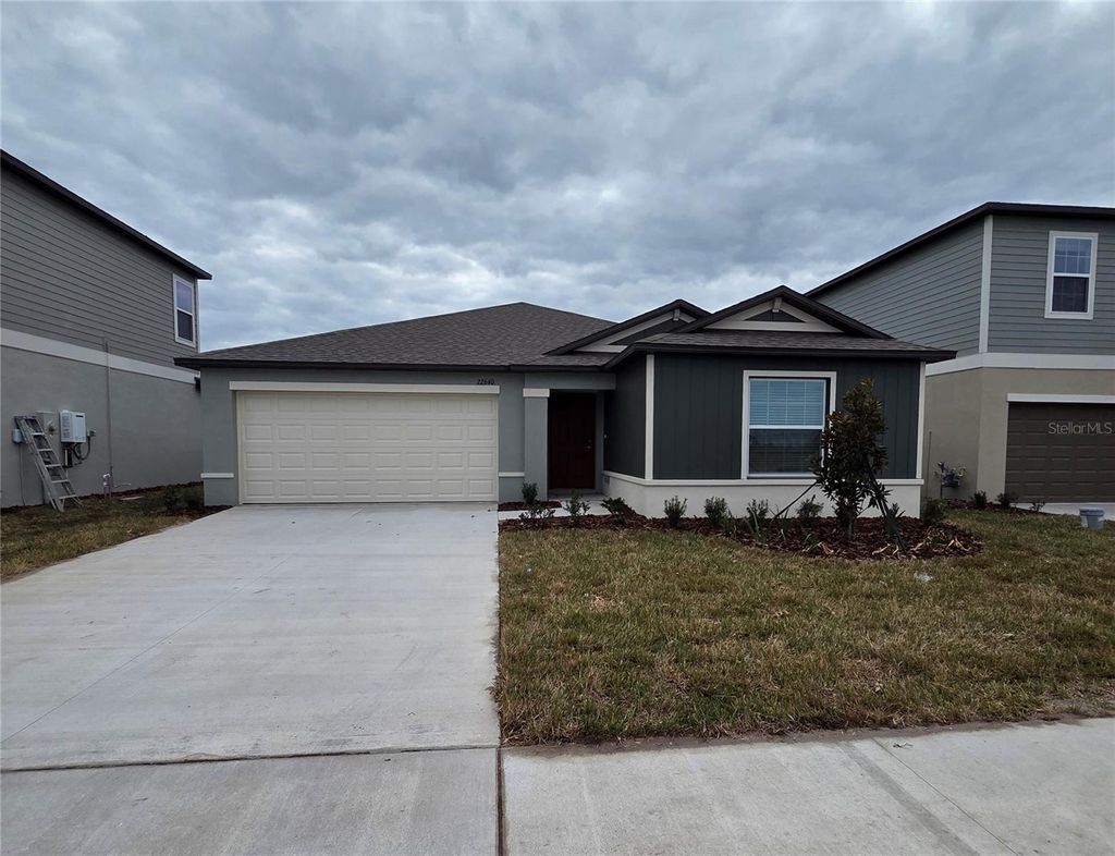 Photo of 22640 Nebula Way, Land O Lakes, FL 34637 (MLS # J998259)