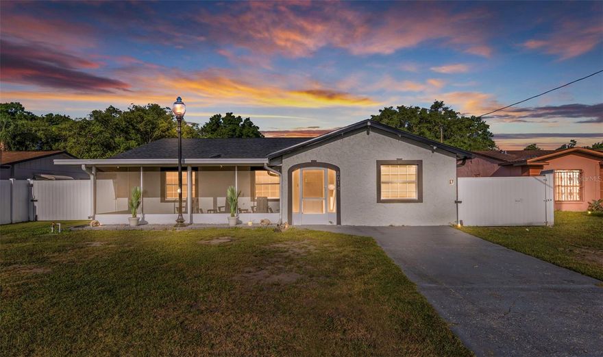 Beautifully updated 3 bedroom, 3 bathroom home offering modern finishes, a functional layout, and exceptional outdoor living. This home features an open concept lay out kitchen with dark cabinetry and bar seating, updated bathrooms with sleek tile and glass showers, and durable wood flooring throughout. The primary suite includes a walk-in closet, and two bedrooms offer private full baths, while a third full bath is conveniently located off the kitchen with easy pool access.

Enjoy your private backyard oasis with a screened-in pool and a brand new paver deck, plus a spacious covered lanai—perfect for entertaining. Situated on a .31-acre lot, the property also includes a detached garage/workshop and covered boat/RV storage located in the rear of the home, along with power gate entry and hard wired security system, a dedicated office space 
/man cave within the screened pool area. 

A rare combination of space, upgrades, and versatility—don’t miss this one!