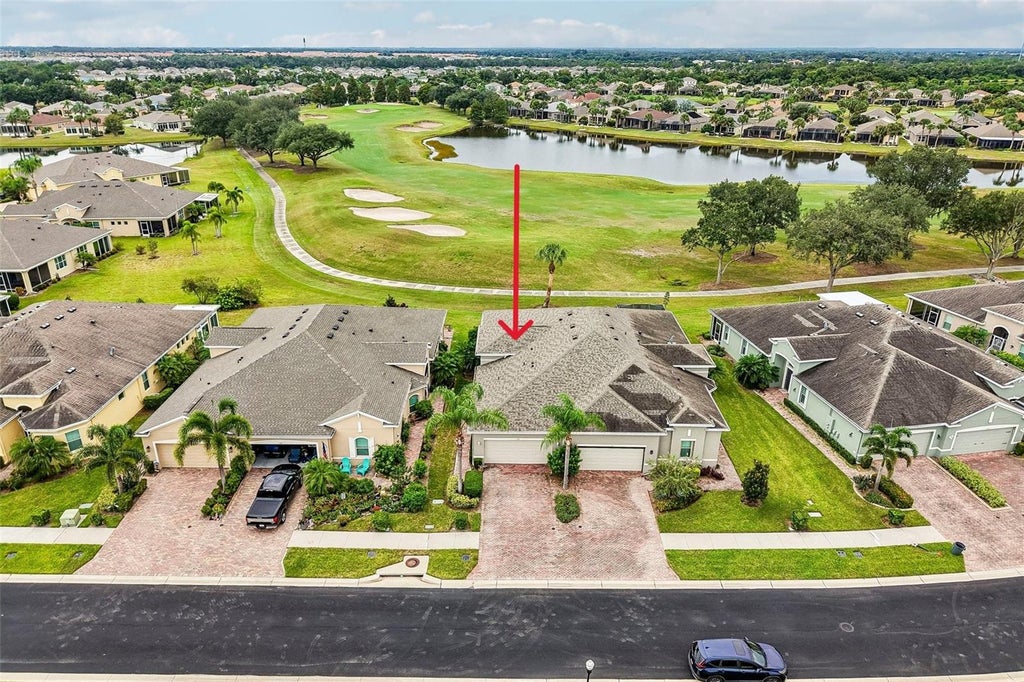 Photo of 718 Chipper Drive, Sun City Center, FL 33573 (MLS # TB8552250)