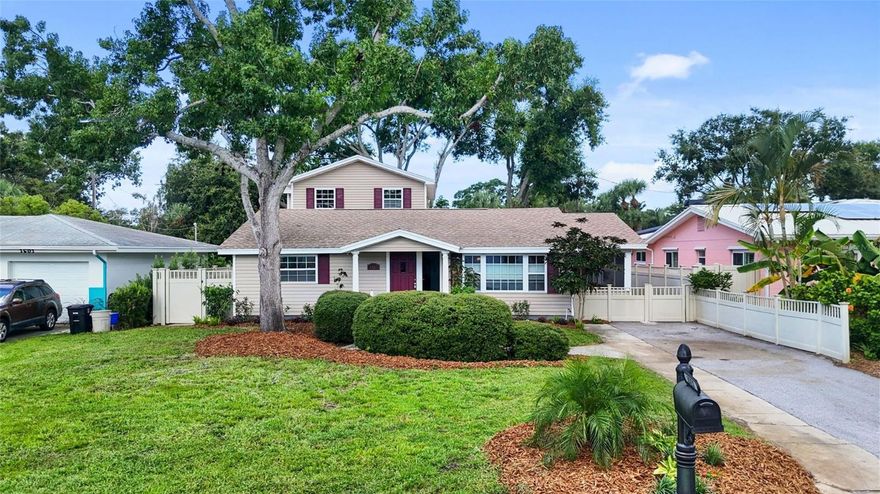 1521 60th St S offers space, flexibility, and peace of mind in one of Gulfport’s most sought-after neighborhoods. With approximately 2,664 square feet, this home provides a level of space that’s increasingly hard to find in Gulfport. The layout is thoughtfully designed to support a variety of lifestyles, from work-from-home setups to multi-generational living. The home sits in Flood Zone X and experienced no storm damage, adding confidence for Florida buyers. Built in 1955 on a slab-on-grade foundation, the main level includes three bedrooms and three full bathrooms, anchored by a generous primary suite with a walk-in closet. A split-bedroom plan offers privacy, while a bonus room with laundry adds everyday convenience. The open kitchen connects naturally to the living and dining areas, and French doors lead to a screened porch for easy indoor-outdoor living. Upstairs, a 2010 addition adds two more bedrooms, a full bath, and a versatile bonus room that works beautifully as an office, studio, or guest space. Outside, the fully fenced yard is shaded by mature trees and enhanced with native Florida landscaping. A sprinkler and drip irrigation system keeps maintenance simple, allowing you to enjoy the space year-round. Located in the Stetson area of Gulfport, just blocks from charming brick streets and minutes from the waterfront district, restaurants, markets, and arts scene. St. Pete Beach and Treasure Island are a 10 minutes drive, downtown St. Petersburg is 15 minutes, and Tampa International and St Pete Clearwater major airports are within a 30-minute drive. Come visit this versatile Gulfport home today!