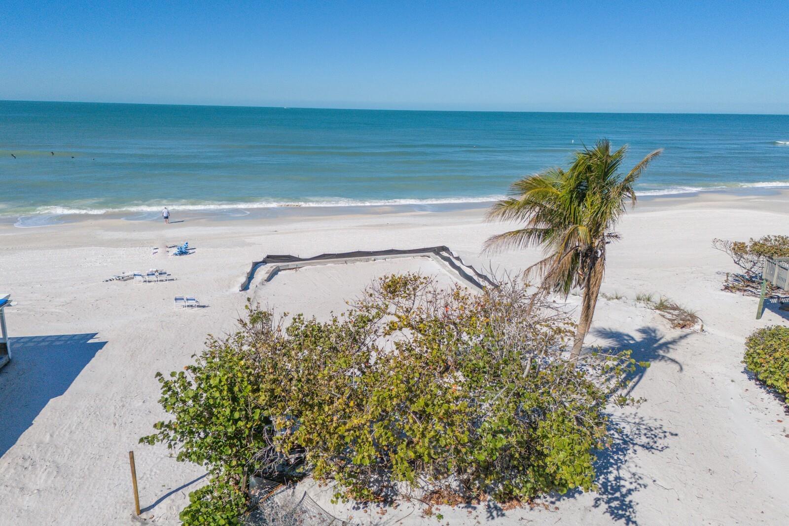 Imagine standing on a pristine, sandy beach on Anna Maria Island’s Holmes Beach, with the gentle waves of the Gulf lapping at your feet. The sun begins its descent, casting a warm, golden glow across the horizon, painting the sky in hues of orange and pink, a daily masterpiece that makes this location special. There’s a prime opportunity to own a vacant lot at 3110 Avenue F, Holmes Beach, FL 34217 plus 50% Interest of 3114 Avenue F with shared driveway. This property offers stunning gulf views, ensuring you can enjoy breathtaking sunsets. Envision a coastal retreat designed to harmonize with the natural beauty of the island, allowing you to fully embrace the serene environment and panoramic water views. Holmes Beach is renowned for its tranquil atmosphere, free from high-rise developments, preserving the island’s historic charm. The community offers a blend of mid-century homes, local boutiques and seafood eateries, providing a quaint, laid-back lifestyle. By choosing this location, you’ll not only have direct access to the beach but also be part of a community that values the preservation of its natural beauty and heritage. It’s an ideal setting where every day ends with a picturesque sunset over the gulf, and the soft, warm sand is close to your door.