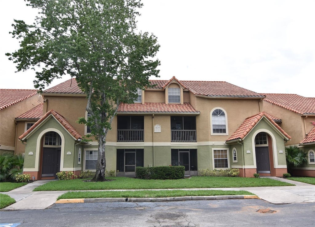 Photo of 409 Fountainhead Circle #234, Kissimmee, FL 34741 (MLS # O6439186)