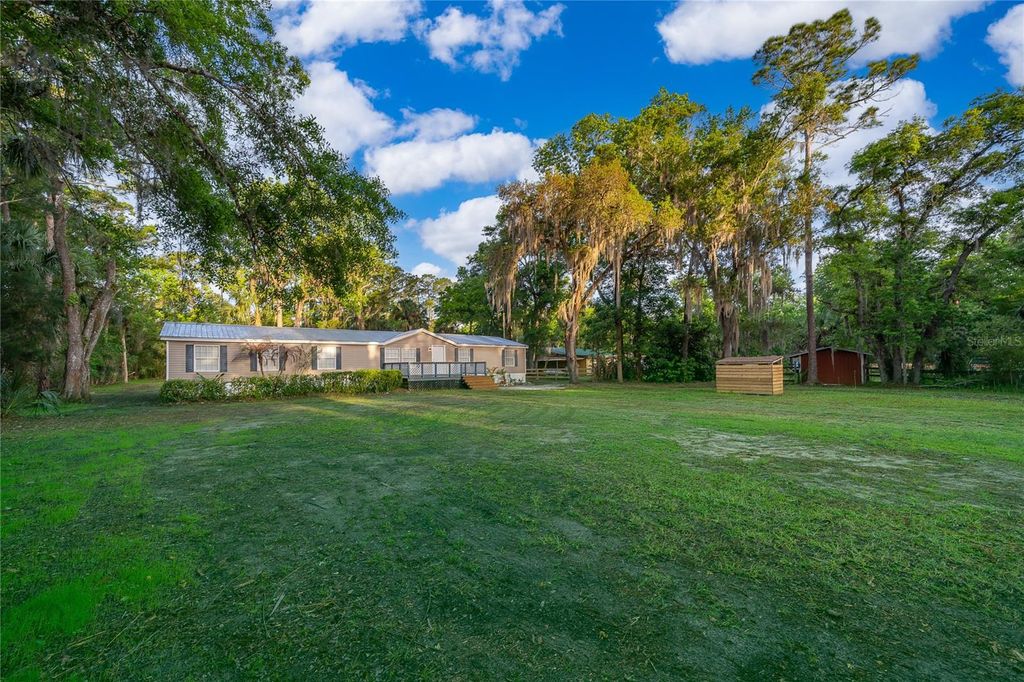 Photo of 1116 Cupid Avenue, Christmas, FL 32709 (MLS # O6394221)