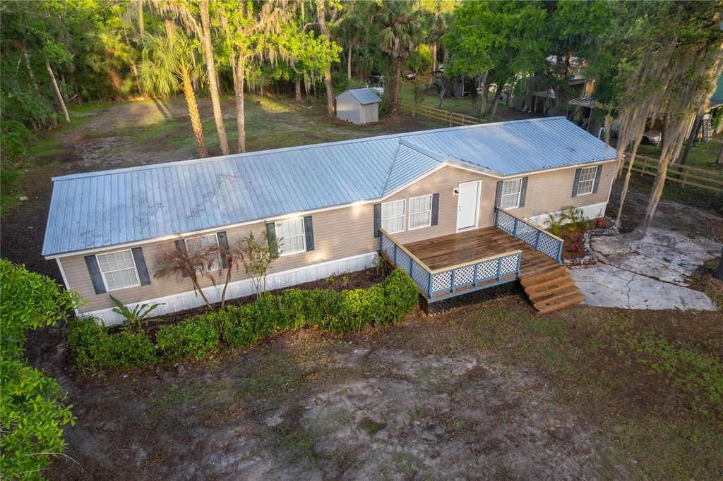 Photo of 1116 Cupid Avenue, Christmas, FL 32709 (MLS # O6394221)