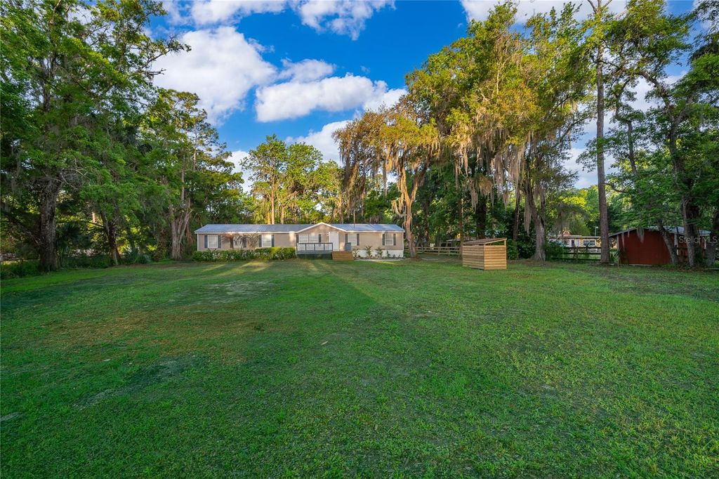 Photo of 1116 Cupid Avenue, Christmas, FL 32709 (MLS # O6394221)