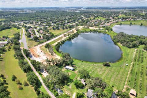 Tiny photo for 133 Tranquil Mirror Lake Court #Lot 16, Clermont, FL 34711 (MLS # O6418985)