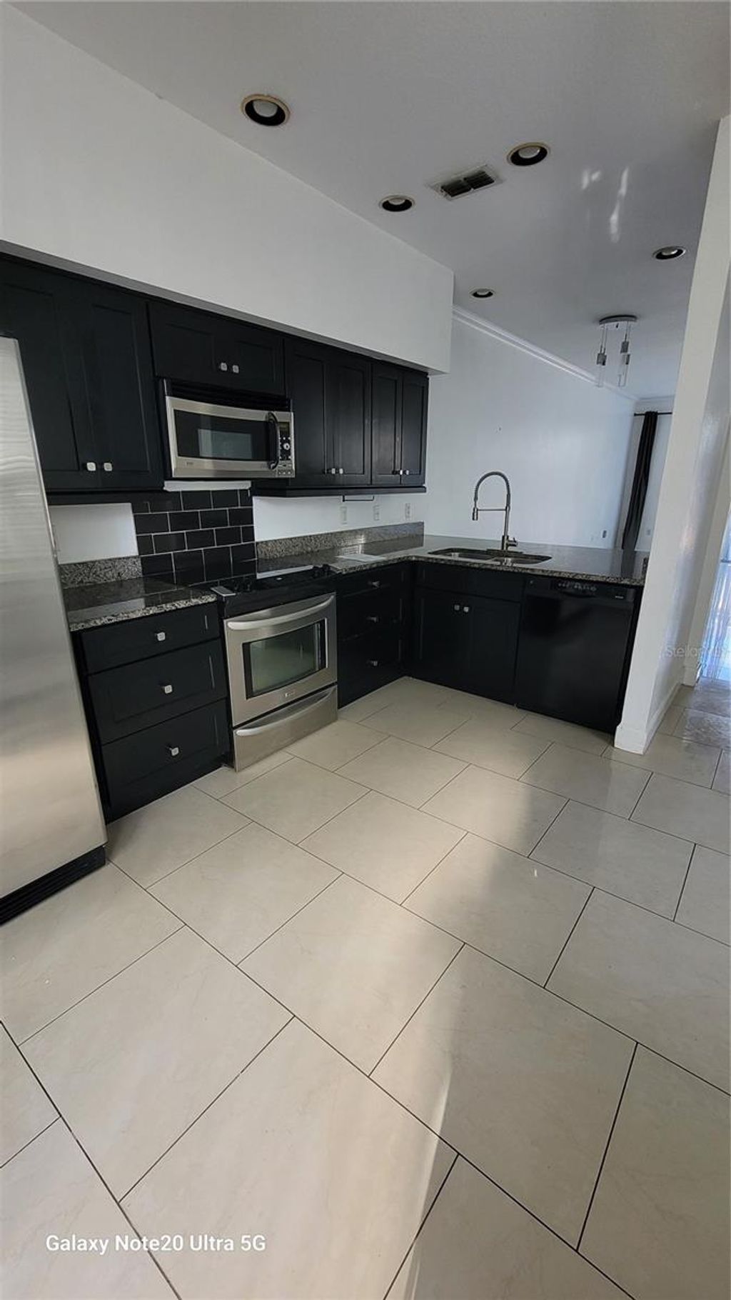 Photo of 1041 Aragon Avenue, Winter Park, FL 32789 (MLS # TB8453961)