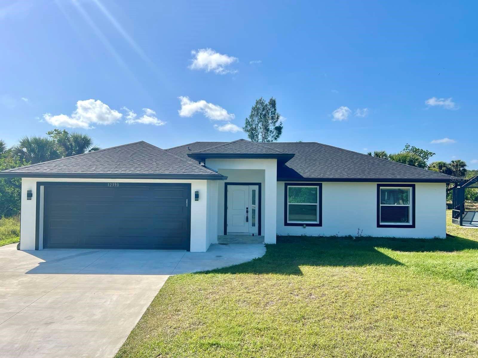 One or more photo(s) has been virtually staged. 2021 built home WALKING DISTANCE (25 minutes) to the beautiful Warm Mineral Springs? Want to be just a short distance to Wellen Park? Look no further. This well maintained home might be just the place for you. 3 Bedrooms, 2 Bathrooms, 2 car garage, clean and cozy with open floor plan. Interior features include larger master bedroom suite w tray ceiling, vaulted ceilings, vinyl laminate flooring throughout, drawer cabinets, 42" upper cabinets, Quartz counter tops, window blinds, open floor plan and much more. Exterior includes screened covered lanai, extra sidewalk and patio space on right side and back of the house, gutters, 8" garage door for higher vehicles and lots more. This property is only one mile away from Warm Mineral Springs, just under 5 miles to Wellen Park and 3 miles to Cocoplum shopping area. A choice of several local beaches within a 30 minute drive. Come and discover this wonderful property for yourself, Schedule your personal showing Today!