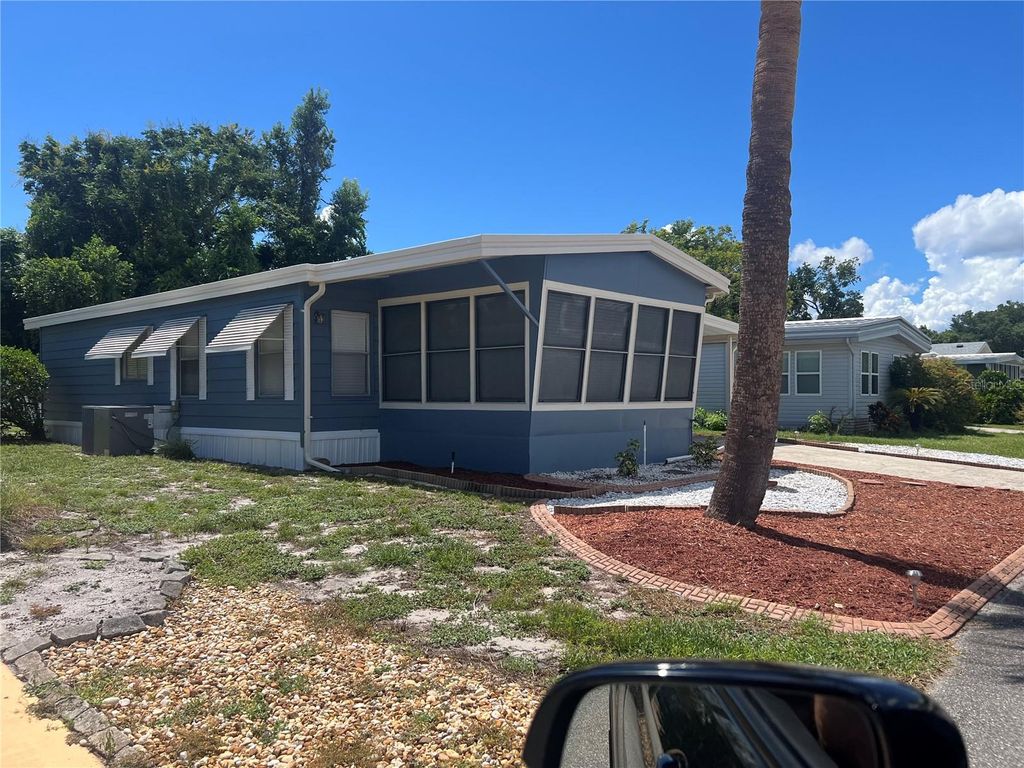 Photo of 212 Paradise S, Leesburg, FL 34788 (MLS # G5103348)