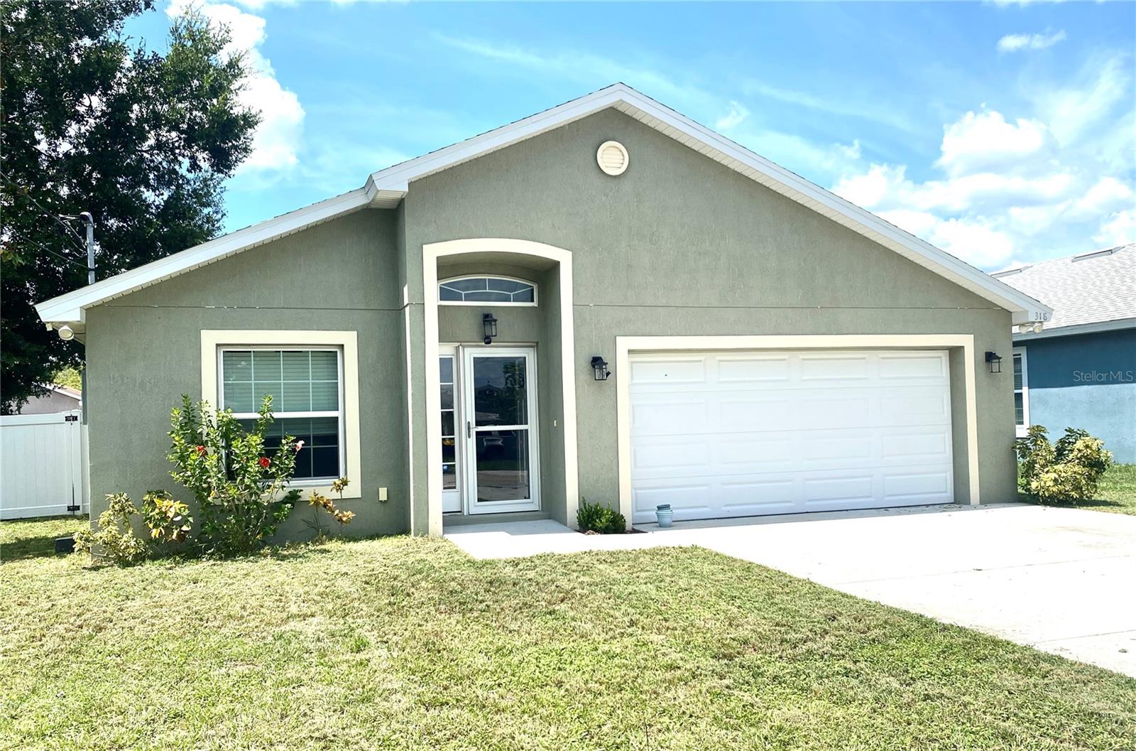 No HOA, No CDD located in the Heart of Auburndale near the newly built community center. This beautifully maintained 4 bedroom, 2 bath home offers 1785 SF of style and functionality. Kitchen offers stainless steel appliances, large island, pantry overlooking dining room/family room combo. Separate living room as you enter the home flows into kitchen/dining/family area. Sliding doors overlook the large fully fenced backyard. The master suite is your private retreat, complete with dual vanities, large garden tub and separate walk in shower. Home also has solar panels. Walking distance to schools, restaurants, shopping. Conveniently located to all major theme parks.