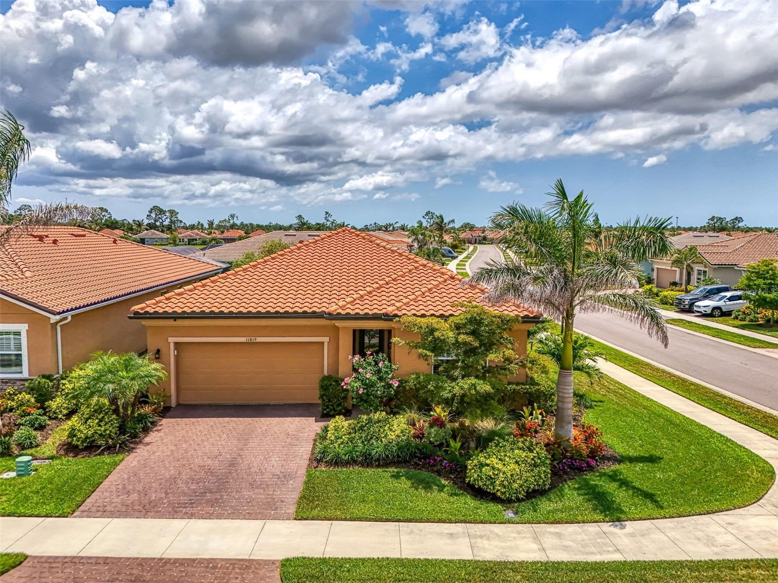 WHY BUY NEW WHEN YOU CAN GET THIS 2021, SPLIT PLAN HOME, LOADED WITH ALL THE BELLS & WHISTLES, THAT WILL SAVE YOU THOUSANDS OF DOLLARS! You’ll love this “2021” 3 bedroom, 2 bath, 2 car garage single family “SMART HOME” with TILE ROOF, FULL SOLAR PACKAGE INCLUDED IN THE PRICE and oversized FENCED YARD located in the beautiful community of Renaissance at Wellen Park! Pets welcomed! HUGE SAVINGS ON YOUR ELECTRIC BILL! Average bill $30. per month! TONS OF SAVINGS! This stunning, well appointed home is LOADED WITH EVERY UPGRADE IMAGINABLE. With over 1,800 square feet of living space, this beautiful home offers an expansive layout designed for both relaxation and entertaining. The moment you arrive, you'll be greeted by the NEWLY CLEANED & RESEALED PAVER DRIVEWAY, setting the tone for the sophistication that awaits inside. Impeccably decorated by the seller, you’ll enjoy the many upgrades throughout and attention to detail, including, wall paper accents, porcelain PLANK TILE flooring, LUXURY VINYL flooring in bedrooms and hallway, PLANTATION SHUTTERS throughout, Monte Carlo UPGRADED CEILING FANS that effortlessly blend form and function, and more! The heart of the home is the GOURMET kitchen, where rustic coastal light fixtures illuminate the center island QUARTZ COUNTERTOPS and enhance the beauty of the upgraded STAINLESS STEEL APPLIANCES, including a modern 4-DOOR REFRIGERATOR and a NEW DISHWASHER. Gather around the spacious island or the cozy dining nook, perfect for enjoying meals with family and friends. The backyard is FENCED WITH BLACK ALUMINUM FENCING, ideal for your children and pets to roam freely, and a screened covered lanai where you can relax and unwind while taking in the tranquil surroundings. Home has been PROFESSIONALY LANDSCAPED with flowering shrubs and beautiful palm trees all around. The master bedroom comes with its own ensuite including a glass walk-in shower, DUAL QUARTZ SINK and HUGE walk-in closet. The 2 guest bedrooms have adequate space and share a guest bath offering a QUARTZ COUNTERTOP & shower/tub combination. A host of extras: FRONT LOAD washer/dryer with storage bases, and an UPGRADED STOP & DROP area right off the garage for added convenience & storage, 8 ft. doors and UV MOLD PREVENTION LIGHT IN THE A/C SYSTEM. Both the front door and garage door have a for easy access KEYLESS ENTRY along with added SEAMLESS GUTTERS, HURRICANE SHUTTERS for all windows and doors! This home truly has it all. Walking distance to the fabulous amenities including a resort style pool, tennis courts, pickleball courts, & fitness center. Best of all, you are just minutes away from Wellen Park’s unparalleled lifestyle with shops, restaurants, entertainment and the renowned Cool Today Park, home to the Atlanta Braves Training Stadium. Don't miss your chance to experience resort-style living at its finest in this exquisite home. Schedule your showing today and make your dreams of luxury living a reality! CDD fee is already included in the yearly RE taxes!