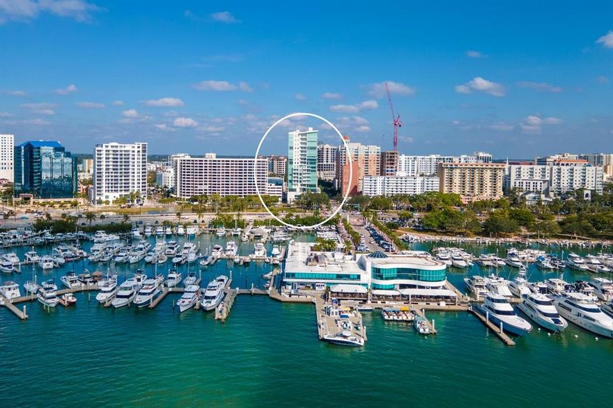 Second-to-none bayfront sunsets & sweeping views are yours from this exquisite, 5th floor, 3 bed/3.5 bath corner unit in downtown Sarasota’s highly coveted Jewel condominium offering unparalleled location and world class amenities to the most discerning of buyers. A polished, modern aesthetic with soaring 11’ ceilings is enhanced by 180 degrees views through an expanse of floor to ceiling glass with Tempus motorized window shades. This home is only one of two on the floor, affording the utmost in privacy. Elevated appointments including design forward lighting & fixtures, pocketing doors and wood floors throughout. The kitchen is a showstopper with upgraded chic white lacquer cabinetry, a large Caesarstone waterfall center island with stainless sink, an azure tile backsplash, all stainless Miele appliances including custom lacquered front refrigeration and an induction cooktop. An open dining room features a navy lacquered built-in lit cabinet designed for display and storage and a new custom chandelier. The owners suite is spacious with incomparable full bay views. A spa-like bath with walk-in shower and soaking tub along with custom large walk-in closet complete the serene space. Private guest bedroom 1 is a large space with a well-appointed ensuite bath and custom closet. The second guest bedroom boasts a custom California Closets built-in system affording various types of storage. An in-unit laundry room with front load washer/dryer and ample storage completes the desirable space. Last but not least is the 64 sf climate controlled owners storage room recently fully customized by California Closets and conveniently located on your floor just around the corner from your front door. The Jewel's desirable location & 19-unit pet-friendly complex caters to the downtown lifestyle with its private on-site garage parking, concierge service & security, and an exclusive entertainment lounge. The 4th floor amenities level features a state-of-the-art fitness center with a yoga & Pilates studio, steam & infrared sauna, open sundeck with infinity-edge pool and spa, outdoor lounge w/summer kitchen & grill, a pickle ball court and croquet/putting green. More photos coming soon!