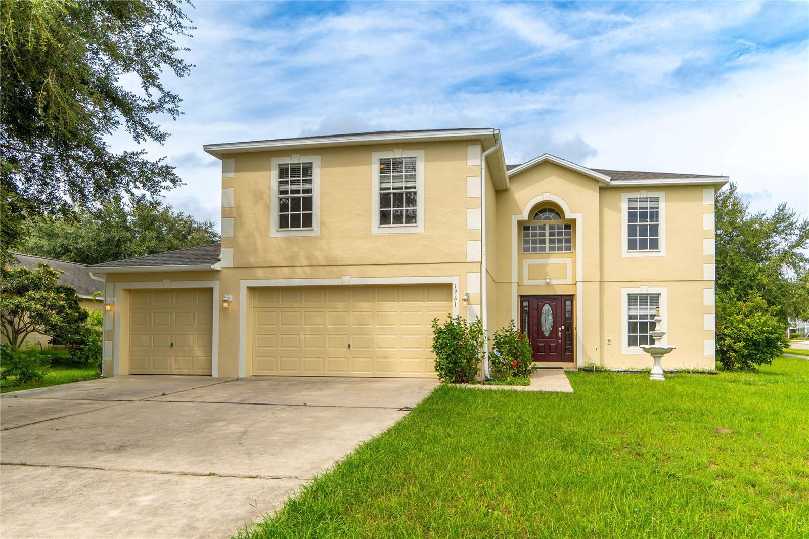 MOVE IN READY AND FRESHLY PAINTED INSIDE AND OUT- NEW ROOF IN 2023! This spacious 4-bedroom, 2.5-bath home offers 2,948 sq ft of living space on a 0.28-acre corner lot. The first floor features a large kitchen with center island, two pantries, and an open layout to the family room—perfect for entertaining. Separate living and formal dining rooms add to the natural flow of the first floor space. Upstairs you'll find a generous primary suite with ensuite bath, three additional bedrooms, and a versatile loft ideal for a media room or home office. Enjoy outdoor living in the screened lanai, and take advantage of the oversized 3-car garage for extra storage.