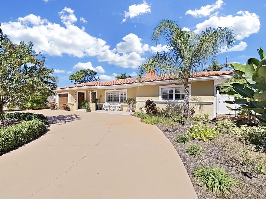 A Spacious Tropical Oasis located in Pasadena Golf Club Estates, a quiet and established neighborhood. This property has NEVER FLOODED. Relax and enjoy, as this home is completely updated and xeriscaped with an irrigation well and no yard to mow. A large circle driveway allows for easy parking. The spacious rooms with abundant natural light and a beautiful patio for entertaining and bar-b-ques make this home a joy. There are two large sets of sliders that glide open with a fingertip and provide tranquil views of the tropical landscaping. This home includes many updates, which include: new HVAC 2025, new washer/dryer 2025, new Hot Water Heater 2023, new Luxury Vinyl Flooring 2024, new premium granite countertop 2025. Home has plantation shutters throughout and gutters. Red tile roof is worry free and new in 2009. Home is located in unincorporated Pinellas County. You will be close to everything! Beaches 5 minutes away. Trendy downtown Gulfport and vibrant downtown St. Petersburg are nearby. Shopping, restaurants, and golf are around the corner. This home is move-in ready and spectacular!
