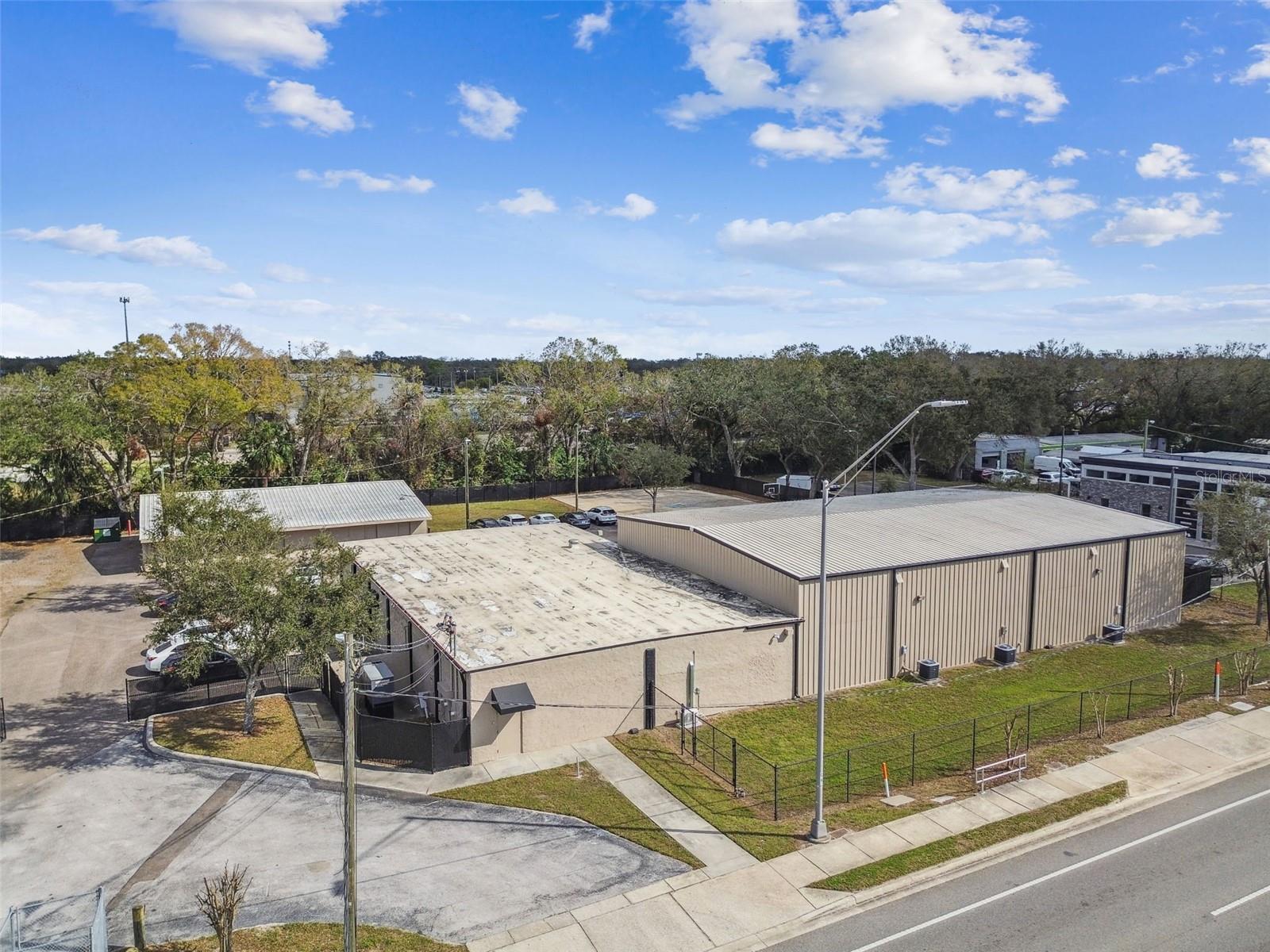 This exceptional commercial property has undergone extensive remodeling, offering state-of-the-art upgrades and a modern, high-performance workspace. Ideal for a variety of business operations, this property blends functionality with high-end finishes, ensuring efficiency, durability, and aesthetic appeal. Key Features & Upgrades: Completely Renovated Showroom – Sleek, modern design with glass partition walls and new flooring. Advanced Electrical System – New electrical panels and wiring, plus Cat 6 wiring throughout for high-speed connectivity. Energy Efficiency & Backup Power – 2 ft insulation throughout and a 50 KW backup power generator with a 100-gallon diesel tank for uninterrupted operations. High-Impact Construction – Metal roofs with polymeric coating and high-impact cement boards for superior durability. Air-Conditioned Warehouse – 20 ft ceilings, epoxy flooring, and two new electric garage doors with openers. Upgraded Infrastructure – Includes a remodeled kitchen, bathrooms, updated septic system and much more. Strategically located in a high-traffic area on N Nebraska Ave just minutes to I-275, this property provides excellent visibility (255 ft frontage), accessibility, and the modern amenities businesses need to thrive (flood zone X). Move-in ready and designed for efficiency – perfect for showrooms, industrial operations, or mixed-use businesses. Zoning - Commercial-Intensive