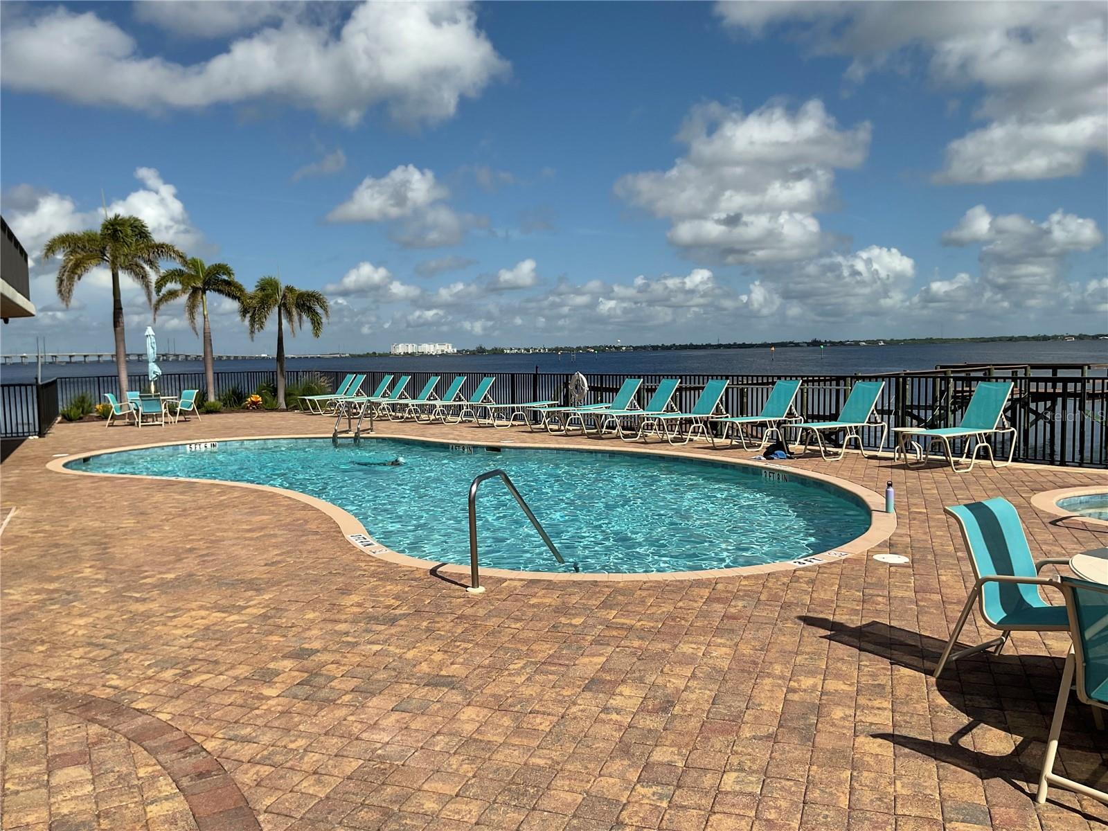 Welcome to your dream rental where stunning water views meet modern living! This beautifully appointed three-bedroom, two-bath condominium offers an unparalleled lifestyle on the picturesque Charlotte Harbor and the location is unbeatable, only a minute's walk to downtown Punta Gorda offering a variety of shops, restaurants, and entertainment options. As you step inside, you'll be greeted by an open and airy layout that maximizes natural light and showcases breathtaking endless water views of the Peace River Charlotte Harbor. The spacious living area flows seamlessly from the kitchen island bar into the open concept family room which makes it perfect for entertaining guests or enjoying quiet evenings at home. There is a separate dining room area for those who may want to host family and friends for dinner parties or offering more room to entertain. Step outside to your private screened in balcony, where you can enjoy morning coffee or evening sunsets while soaking in the stunning vistas of the Peace River. This 3 bedroom 2 bath condo gives you the privacy needed as this floor plan offers spit bedrooms. When you are ready to retreat to the primary bedroom you'll be wowed by the serene water views as well as its own ensuite bathroom with a walk-in shower and dual sinks. The two additional bedrooms have plenty of space for family, guests, ensuring you have the flexibility to meet your needs. The guest bathroom has a shower/Tub combo and lots of room to get ready. No need to step outside the condo to do your laundry as this condo offers the convenience of having a laundry area inside the unit. adding to the ease of everyday living for all who stay. Don’t miss this incredible opportunity to rent a piece of paradise at 900 E. Marion Unit 1213.