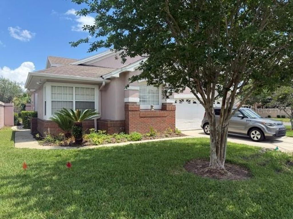 Photo of 14453 Windchime Lane, Orlando, FL 32837 (MLS # O6408655)