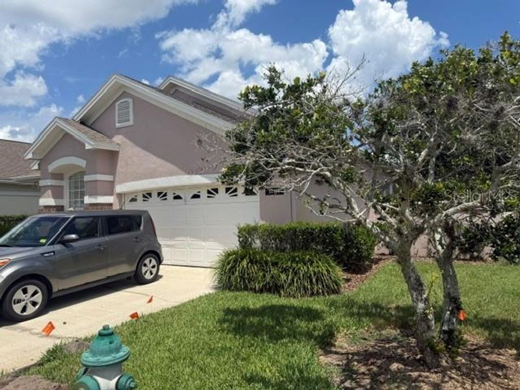 Photo of 14453 Windchime Lane, Orlando, FL 32837 (MLS # O6408655)