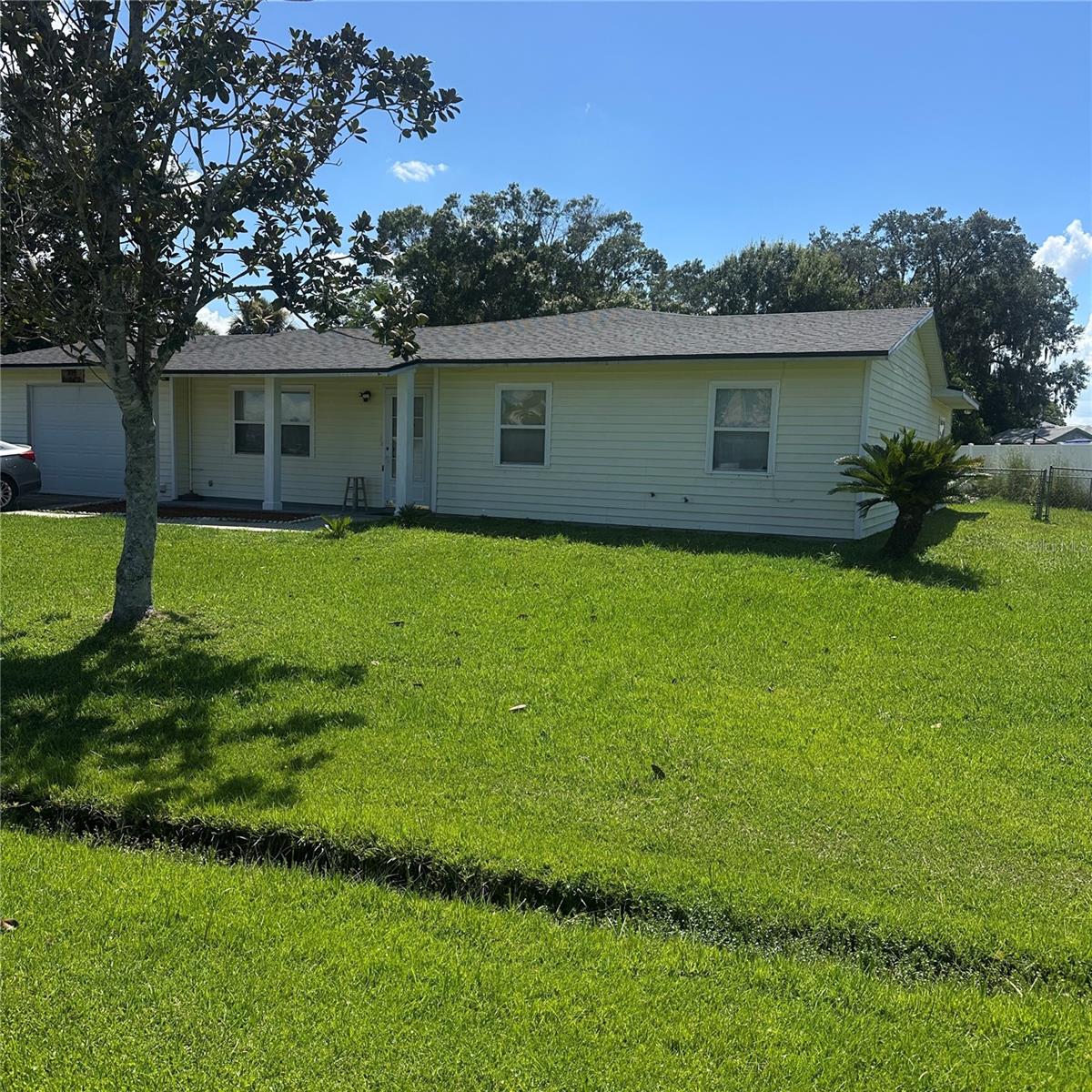 Welcome to this cozy residence located at 704 Del Ray Dr, Kissimmee, FL 34758. The spacious primary bedroom features a sitting area, a wall closet, and a walk-in closet—offering great comfort and storage space. The family room is currently being used as an additional bedroom, giving you the flexibility to keep it as an extra room, office, or return it to its original use as a family room. It includes a built-in wall unit with pull-out shelves and integrated lighting, perfect for books or decorative items. The fully fenced backyard offers generous space with plenty of potential—ideal for a future pool, play area, or outdoor gatherings. Located in a quiet and established community, this home is just minutes from schools, shopping, restaurants, and major roads. The property is in good condition and move-in ready with no repairs needed. Schedule your private showing today!