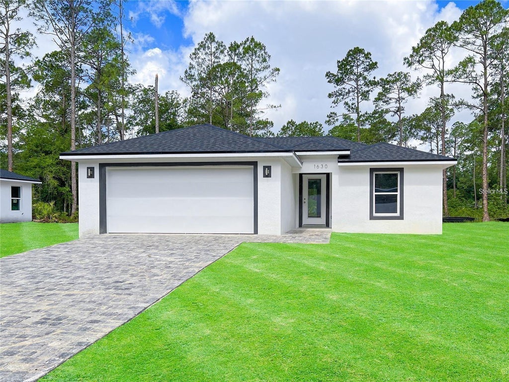Photo of 1630 11th Avenue, Deland, FL 32724 (MLS # S5159240)