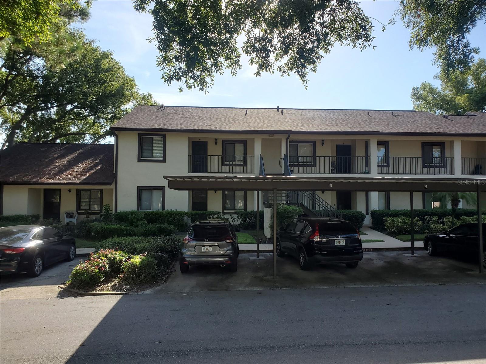 ***$100 OFF first month's rent for lease by October 1, 2025*** Corner 2 Bed/2 Bath condo with assigned carport and community pool in Magnolia Ridge. This 2nd floor unit freshly painted condo features a light and bright eat-in kitchen, spacious living and dining room combo with vaulted ceilings, two large bedrooms, laundry room with washer and dryer, and screened lanai located off the living area. There is one assigned carport space and plenty of additional guest parking right in front of the building. Excellent Palm Harbor location convenient to shopping, restaurants, entertainment, grocery, medical, airports and beaches! Rent includes cable, water, sewer and trash. Sorry no pets.