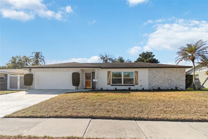 Immediately Available : Belle Isle Gem in Castle Place!

Welcome home to this lovingly cared for 3-bedroom, 2-bath concrete block residence with a 2-car garage, nestled in the quiet community of Castle Place. The freshly painted exterior (2024) and re-sodded lawn (2022) and updated landscaping create inviting curb appeal, while the beautiful front entry with storm door allows for abundant natural light.

Step inside to a welcoming foyer that opens to a spacious living room featuring a neutral color palette, modern brick-laid tile, and newer wood laminate flooring (2020). The ideal split and versatile floor plan offers both privacy and flexibility for everyday living and entertaining.

Upgrades include timeless crown molding, double-pane energy-efficient windows, updated wood laminate flooring & tile, and a beautifully renovated primary bathroom (2022), recessed lighting (2025) water heater (2025) attic insulation (2025) 

The kitchen truly serves as the heart of the home, highlighted by an elegant tray ceiling and a window over the sink overlooking the picturesque backyard. Features include granite countertops, stainless steel appliances, refreshed white cabinetry, a range hood, pantry space, and a breakfast bar for casual dining.

The split layout leads to a serene primary suite with a walk-in closet and a stunning en-suite bath complete with granite countertops, updated cabinetry, and a remodeled shower featuring subway tile and a soothing rock floor. On the opposite side of the home, the family room connects to the second and third bedrooms and a full bath, also appointed with granite countertops.

Sliding glass doors open to a spacious covered lanai, showcasing a one-of-a-kind custom mural, and an entertainer’s dream backyard. Enjoy custom horizontal wood fencing, a paved fire pit area, mounted outdoor TV space, market lighting, and generous green space for gatherings or play. The exterior continues the low-maintenance lifestyle with hardy landscaping, palm trees, vinyl side gates for toy storage (NO HOA), stone façade accents, and a two-car garage — washer and dryer included.

Outdoor enthusiasts will love being less than a mile from both the Perkins Boat Ramp and the Randolph Boat Ramp. Enjoy a short walk to Delia Beach Park and additional city parks offering green space, dog runs, and family-friendly recreation.

Conveniently located near major expressways, shopping, dining, and Florida’s world-renowned attractions, this clean and meticulously maintained home is a must-see. ** Seller to install a new shingle roof prior to closing ** Schedule your private showing today!