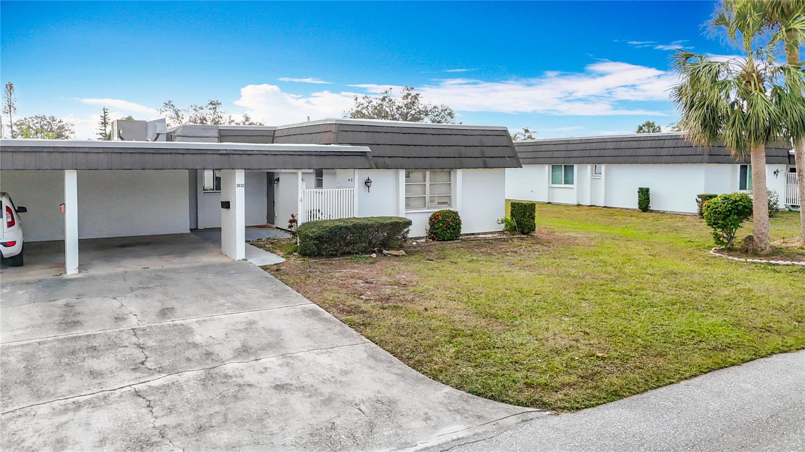 Must see this great deal! Gorgeous 2-Bedroom, 2 Bath, 1,372 sq ft home in the fabulous Glen Oaks Village. This place is absolutely phenomenal, features include an open floor plan, brand new kitchen with stainless steel appliances, granite countertops, new cabinets, remodeled bathrooms with all new faucets, finishes and light fixtures, new laminate wood floors and new carpet throughout, freshly painted interior and exterior, private master suite with on-suite bathroom a stand-up shower and an additional 168 square foot air-conditioned Florida Room. Exterior features a large backyard and no rear neighbors. Community features a clubhouse, pool, and shuffleboard. This home is ideally situated, providing easy access to shopping and dining. It's a must see!
