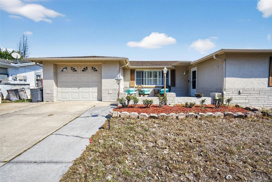2-bedroom, 2-bath home with a beautifully screened pool and NO HOA in sunny Port Richey! Offering approximately 1,426 sq ft of living space plus a garage, this well-maintained property features spacious living and dining areas with plenty of natural light throughout. The back patio is perfect for everyday living and entertaining in the comfort of your new home.