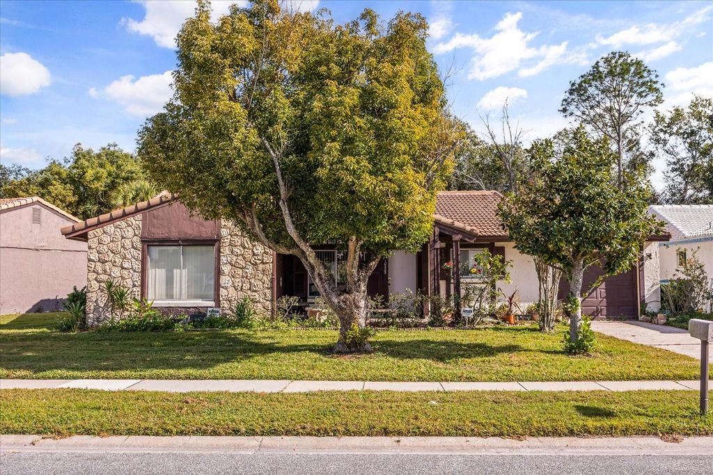 Photo of 10325 Marco Polo Drive, Orlando, FL 32821 (MLS # O6369401)