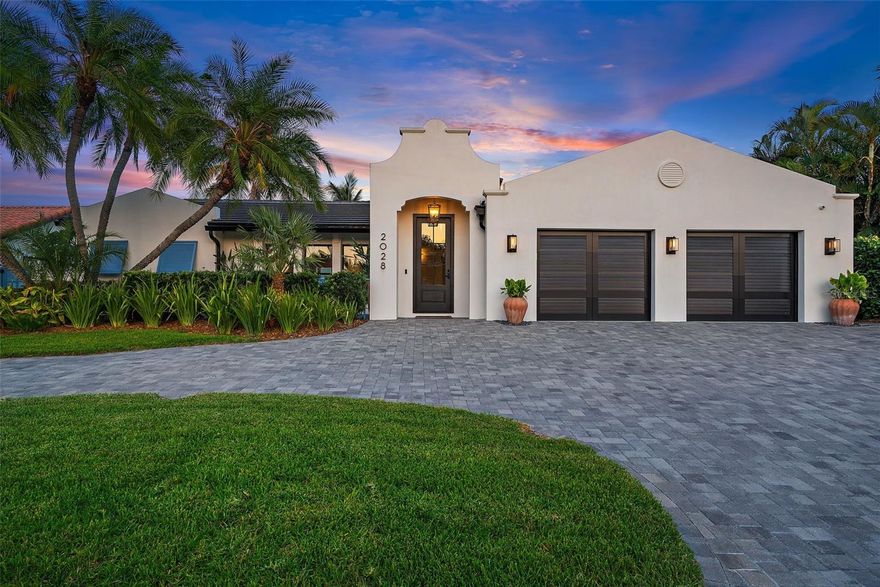 Back up offers encouraged. Welcome to Paradise in the coveted neighborhood of Venetian isles. This is your opportunity to own a truly unique home. Located on the only street in Venetian Isles that is not bound to the deed restricted covenants means architectural freedom to make a home truly exceptional. This West Indies inspired coastal masterpiece blends contemporary and traditional styles that truly implement indoor/outdoor living. From the moment you pull up you will notice the high elevation, picture professional landscaping, and custom features such as the garage doors, and the aluminum coated Bahamian shutters. The entire residence went under an extensive transformation in 2020 from the new tile roof, hurricane impact windows and doors, private front courtyard with a water feature. New elevated front entry sets the tone of what to expect from this waterfront oasis. New wood plank tile flooring throughout. Dream kitchen with 3” Cambria Quartz and top of the line Wolf/Subzero/Cove appliances. For those who like everything to have a place this home will captivate you. Custom cabinetry keeps everything at your fingertips without having to stare at it all day. Dual zone wine/beverage cooler with pull out cabinets for bar storage. Built-in plumbed coffee station and microwave also tucked away. Restoration Hardware lighting and fan package coupled with the custom window treatments will make you feel as though you are in the pages of a designer magazine.  Every inch of this home has been upgraded including the smooth freshly painted walls, all new interior solid wood doors, recessed lighting on dimmers that complement and add to the level of sophistication this home demands.  Primary bedroom featuring custom cabinetry in the walk-in closet and stunning en-suite bathroom with designer selected tiles and finishes throughout all three bathrooms. Ideal layout featuring split floor plan, living room, and dining room. Jack and Jill bedroom with bathroom. 4th bedroom with a sliding door that conveniently leads out to the pool and access to a full bathroom that also serves as a guest/pool bathroom. The entire rear of the home opens up to the incredible 950 square feet of covered Cypress tongue and groove outdoor living space with Shellock pavers, custom Sekas pool, remote controlled phantom shades, an outdoor shower, and 3 distinctive living spaces. Outdoor dining area and kitchen with a BBQ and beverage cooler. A stunning built-in gas fireplace with mounted TV. All outdoor cabinetry is maintenance free HDPE weatherproof material. Due to the uniquely deep lot outdoor living like this would be very hard to replicate. Three zone sound system outside and exterior wifi repeaters for internet coverage throughout the outdoor living areas and dock mean you can work or play from anywhere you desire! Dock features water, electric, and a 13k boat lift with no bridges and direct access to Tampa Bay. Oversized 2 car garage means you can actually park 2 cars and have room for your toys.  Beautiful indoor laundry and so much more. Extensive list of upgrades available upon request. Come see why so many choose to call Venetian Isles home. Only a few minutes (by boat, bike, golf cart, or car) to Downtown St Petersburg’s finest shopping, dining, and attractions. With quick, convenient access to TIA, Albert Whitted Private Airport, and only 15 miles to our world renowned white sand St Pete Beach.