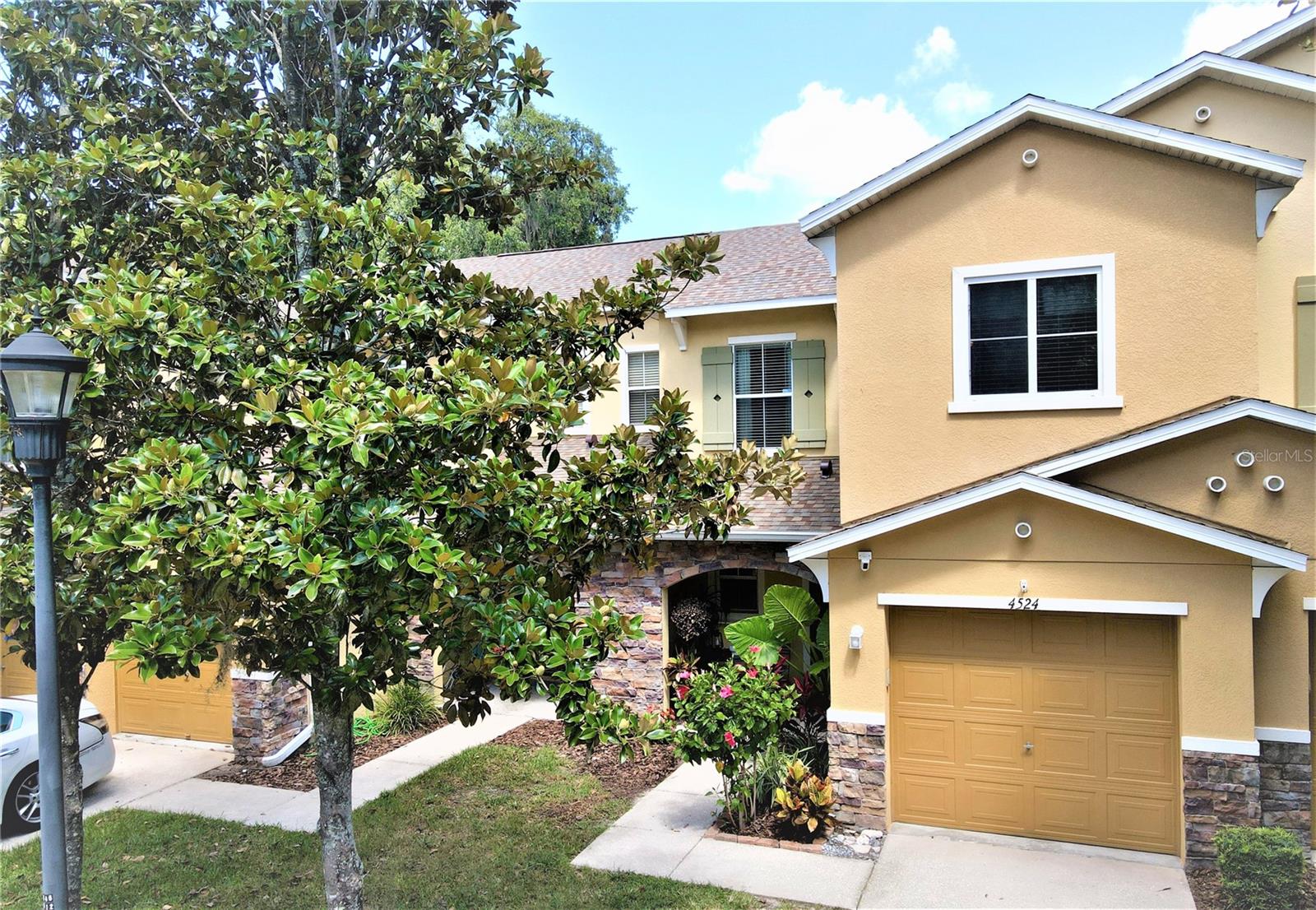 GREAT LOCATION with access to I-4 and I-75! This 3/2.5 Bath Townhome is Move In Ready and has a full 1 Car Garage. Kitchen includes updated raised panel cabinets, backsplash & Sleek Quartz Counter tops plus a Full Appliance Package. BEAUTIFUL Bamboo Flooring on the Main Floor. New Carpet added in the Bedrooms and tasteful paint colors throughout. AC was new in 2018 and the Roof was just replaced in 2023. The Primary Bedroom has a large Walk-In closet and the Primary Bath has a shower and relaxing Garden Soaking Tub. Convenient Interior Laundry. The guest bath offers a pedestal sink. Plenty of Storage throughout the home including pantry, linen closet and under stair storage. Covered Patio. The Community Offers a pool and the Monthly Maintenance Fees cover Internet (& Cable with DVR & 2 Cable Boxes), Water, Trash, Exterior Lawn & Shrubs. This super clean home is ready and waiting for you!